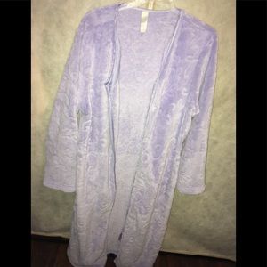 Light lavender robe.